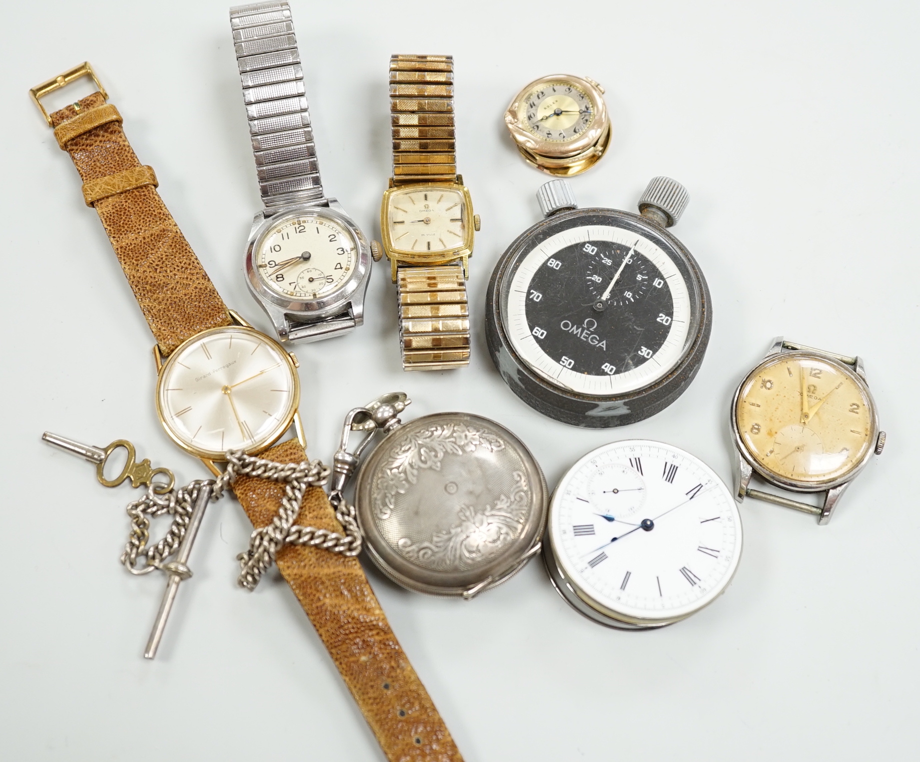 A lady's 9ct Rolex watch (a.f.), a stainless steel Enicar military watch, a gentleman's stainless steel Omega manual wind wrist watch, cased diameter 35mm, five other watches or movements and an Omega stop watch.